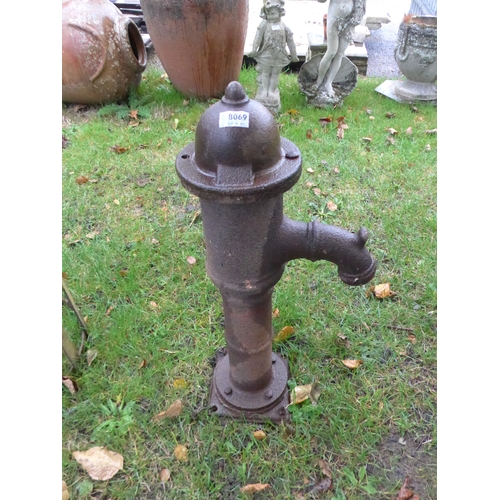 8069 - A cast iron water pump, 71cm tall