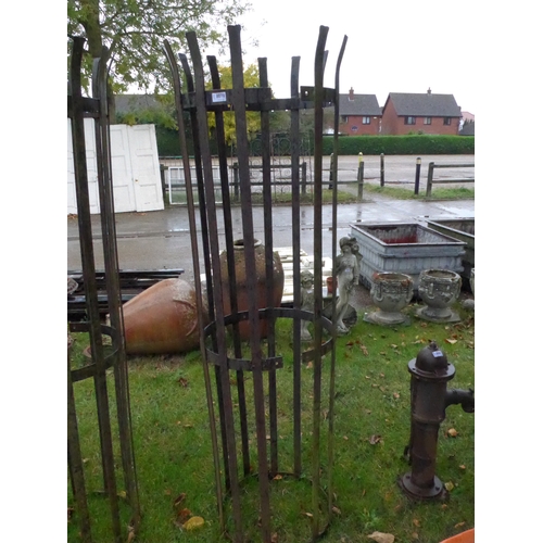 8070 - A wrought iron tree guard in two sections