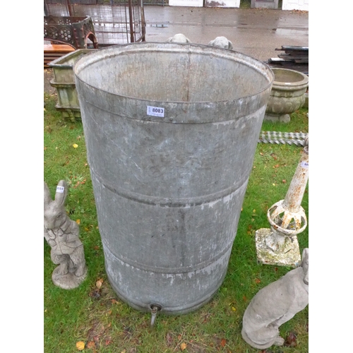 8083 - A circular galvanised tank with tap, 93cm tall, 58cm diameter