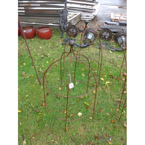 8097 - A pair of steel rust finish cloches