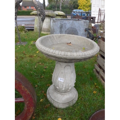 8122 - A decorative composition birdbath, 49cm tall