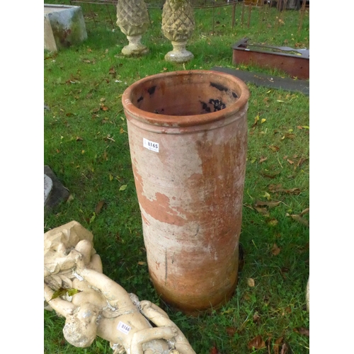 8165 - A terracotta chimney pot, 70cm tall