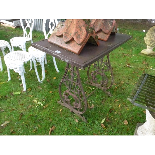 8170 - An iron garden table, marble top