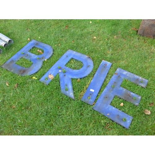 8223 - Four blue metal letters; B,R,I and E, 60cm tall