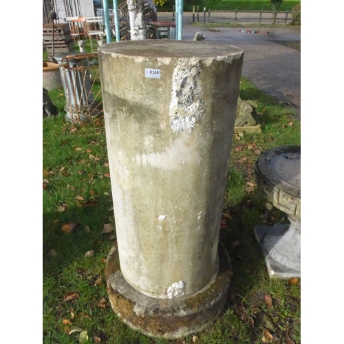 8268 - A weathered sandstone column, stepped base