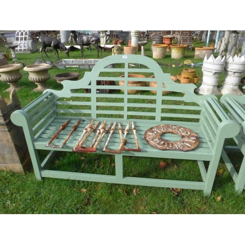 8276 - A green painted hardwood Lutyens style garden bench