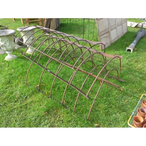 8289 - Three curved iron tree guards