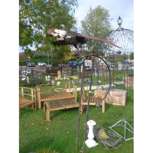 8296 - A blacksmith hand crafted flying bird garden ornament on counterweights which then flaps the wings s... 