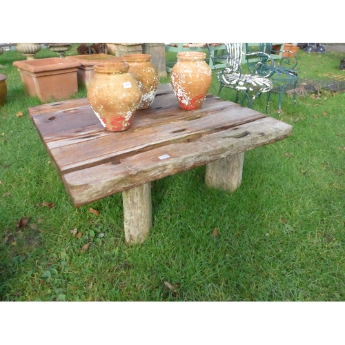 8326 - An Indonesian teak low garden table