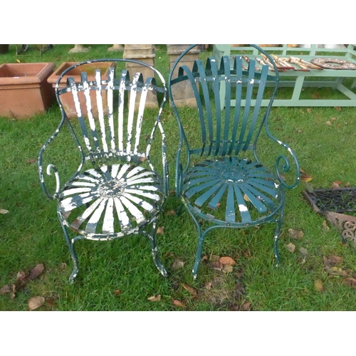 8328 - A near pair of French wrought iron chairs a/f