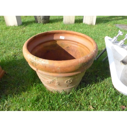 8348 - A large terracotta floral pattern pot, 40cm tall, 51cm diameter