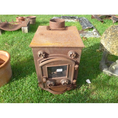 8358 - A small cast iron wood burner