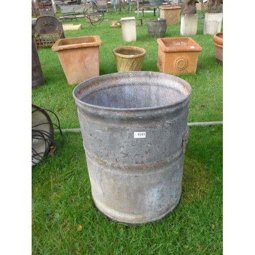 8382 - A round galvanised twin handled bin