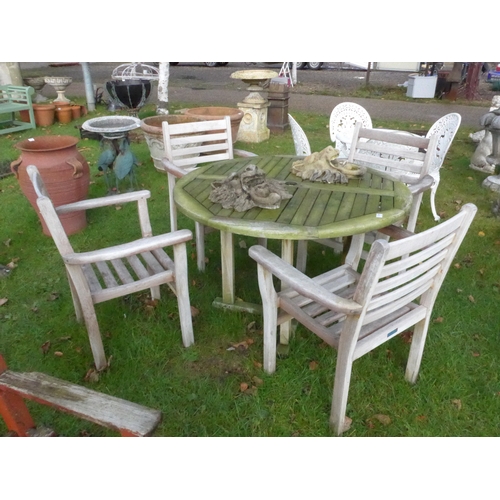 8393 - A 'Lindsey' teak garden table and four chairs