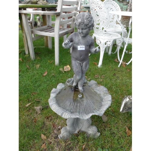 8404 - A lead shell shaped cherub topped fountain on three fish base, approx 70cm tall