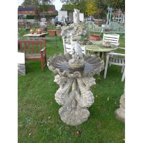 8406 - A weathered composition fountain, three seahorse base, cherub top, approx 150cm tall in total