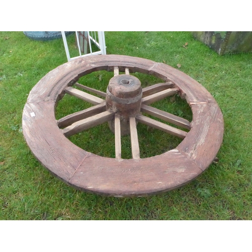 8408 - An Eastern hardwood carved cart wheel, reputedly from the North West Frontier border