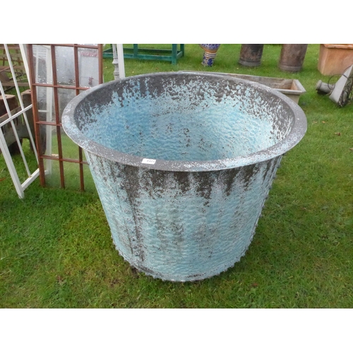 8411 - A large verdegris finish planter, 97cm diameter