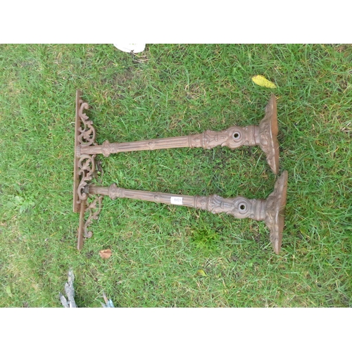 8421 - A pair of decorative iron balustrades/table ends