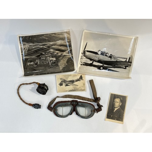 9045 - A pair of WWII flying goggles together with aircraft photograph, ephemera and flying helmet micropho... 