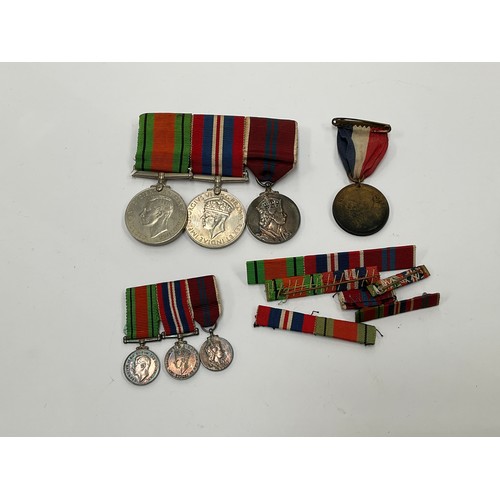 9418 - A WWII British pair of medals (Defence and War medals) together with an Elizabeth II Coronation meda... 