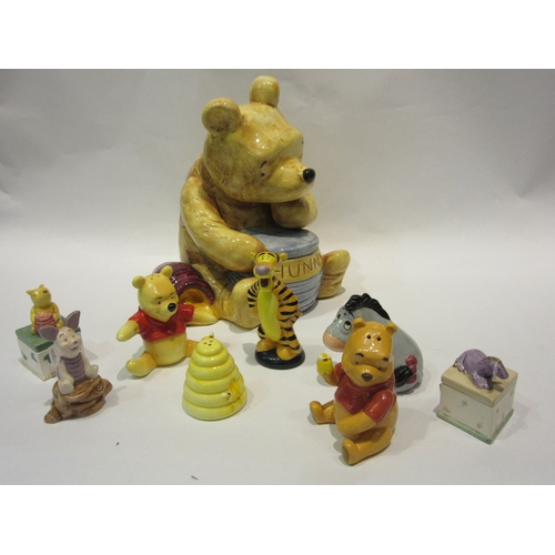 4271 - Various ceramic Winnie The Pooh figures to include Classic Pooh Disney money box designed by Charpén... 