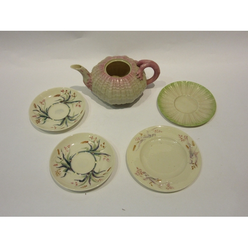 4273 - A collection of Belleek including pink teapot (no lid), three saucers and plate (5)