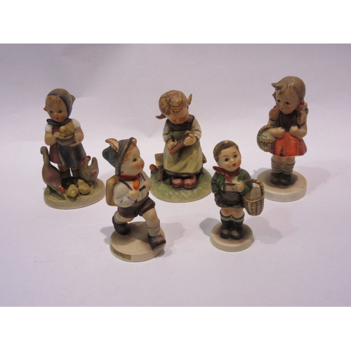 4275 - Five Goebel Hummel figures including girl with chalkboard dated 1963