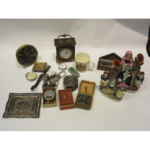 4449 - A box containing gentleman's wristwatches, clocks, thimbles, silver plated dishes, two Staffordshire... 