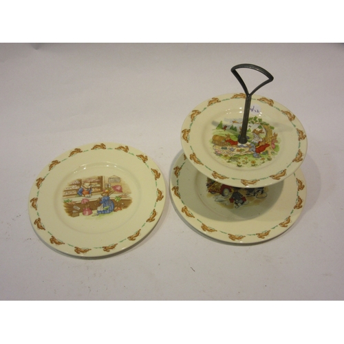 4455 - A Royal Doulton Bunnykins two tier cake plate and dinner plate