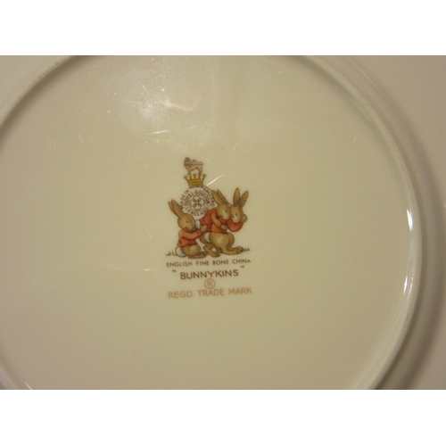 4455 - A Royal Doulton Bunnykins two tier cake plate and dinner plate