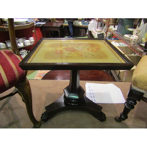 4010 - A 19th Century rosewood wine table with needlepoint glazed top over a trumpet shaped chamfered colum... 