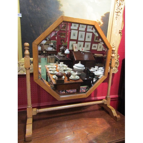 4023 - A circa 1920 natural oak dressing chest mirror, with tilting octagonal bevel edge, (70cm x 66cm tota... 