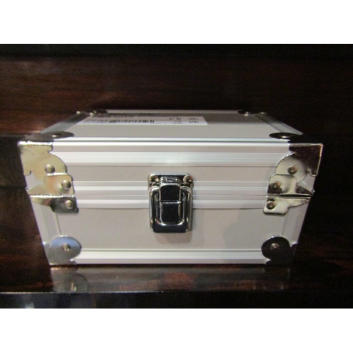 4027 - A cased set of 1g - 500g calibration weights, contains 12 stainless steel weights and a brush