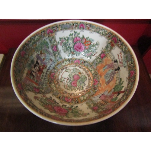 4047 - A Chinese famille rose centrepiece bowl with floral decoration and panels depicting various figures,... 