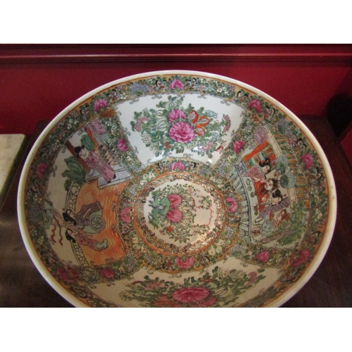 4047 - A Chinese famille rose centrepiece bowl with floral decoration and panels depicting various figures,... 