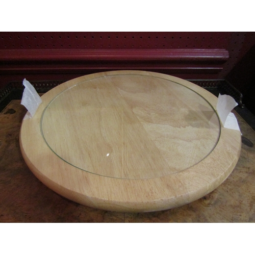 4053 - A beech wood Lazy Susan with glass insert, 35cm diameter