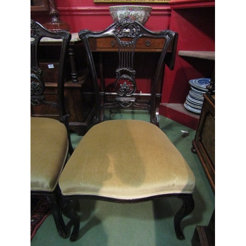 4066 - A pair of Edwardian upholstered bedroom chairs on cabriole fore legs