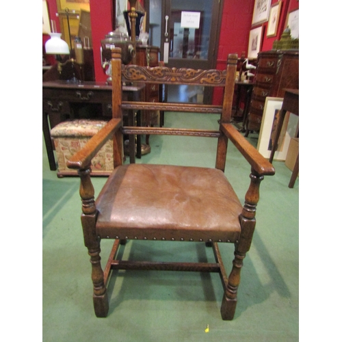 4073 - A Titchmarsh & Goodwin carved oak armchair