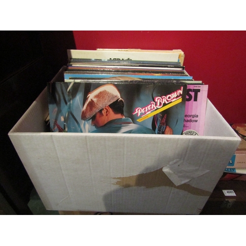 4084 - A box of vinyl LP records including The Monkees, Diana Ross & The Supremes, Bill Haley, The Beatles ... 