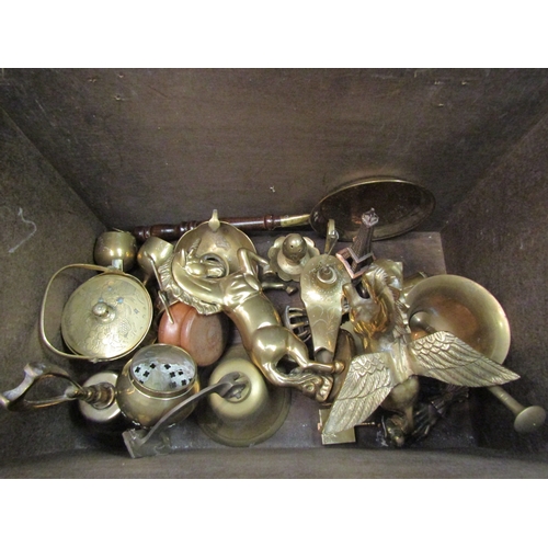 4107 - A brass coal box containing a quantity of brassware including unicorn figure, pestle and mortar, bel... 