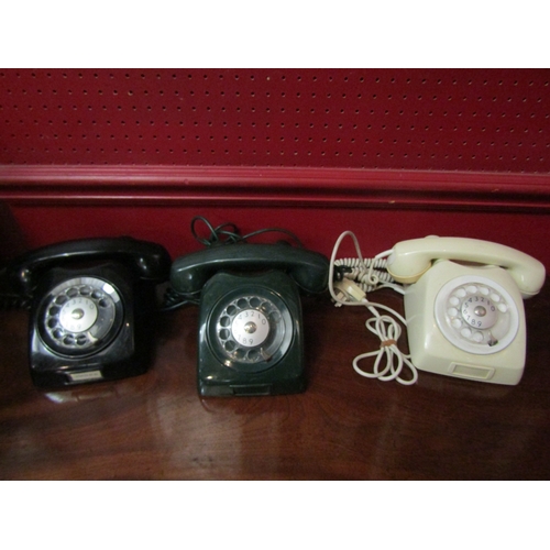 4122 - Three vintage dial telephones including a green example