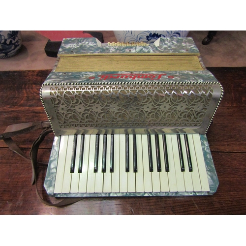 4124 - A Lombardi pearlescent accordion in leather case