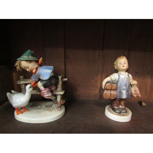 4142 - Four large West German Goebel Hummel figures including boy on fence dated 1948