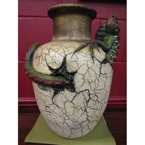 4165 - A pottery vase hand painted with a crackled effect and chameleon figure breaking out from the vase, ... 