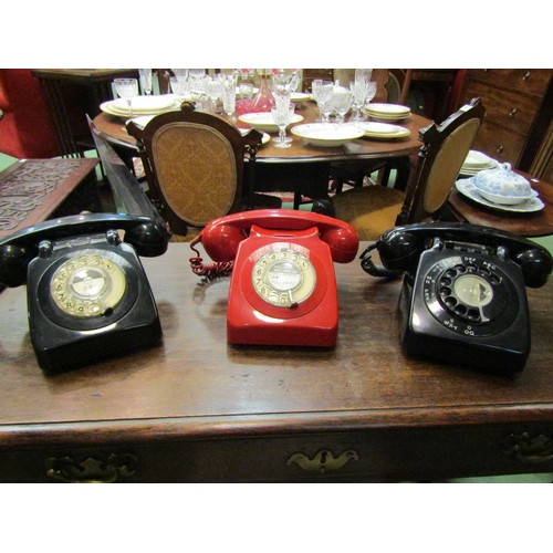 4170 - Three vintage dial telephones including a red example