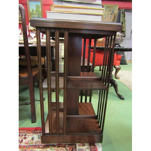 4187 - In the manner of Bevan & Funnell an Edwardian style crossbanded mahogany revolving three tier, four ... 