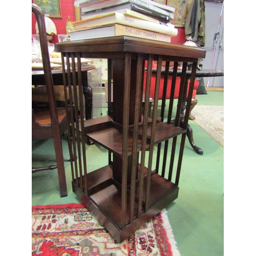 4187 - In the manner of Bevan & Funnell an Edwardian style crossbanded mahogany revolving three tier, four ... 