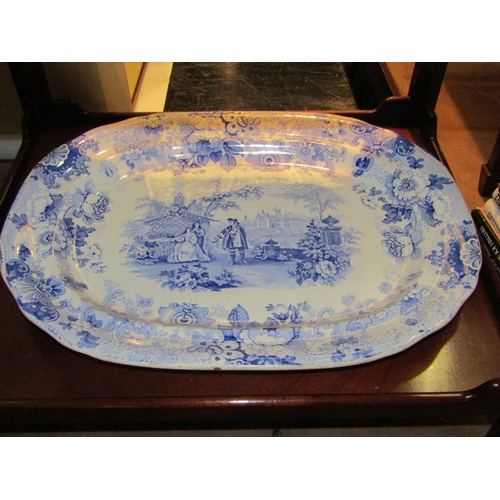 4224 - A Victorian Davenport blue and white meat platter, figural scene with floral detailing, 52cm long