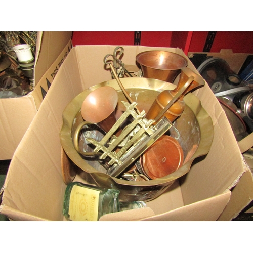 4245 - Two boxes of mixed brass and copper ware to include horse brasses, chargers, fire tools and a table ... 